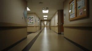 Long empty nursing home hallway